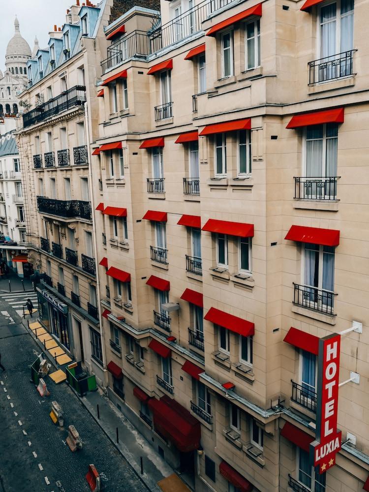 Hotel Luxia Paris Bagian luar foto